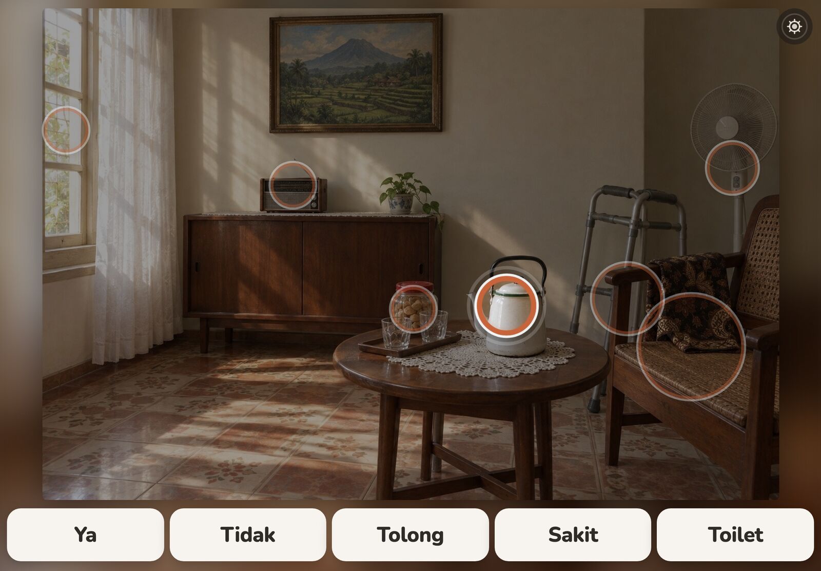 Speak mode on a tablet: the room dimmed, the kettle lit inside an enlarged terracotta ring, and five large core-word buttons along the bottom: Ya, Tidak, Tolong, Sakit, Toilet.